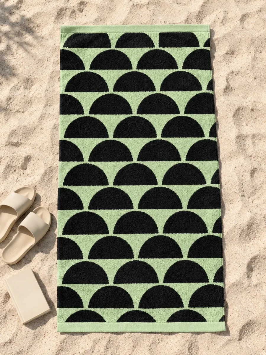 Halves Beach Towel spread out on the sand
