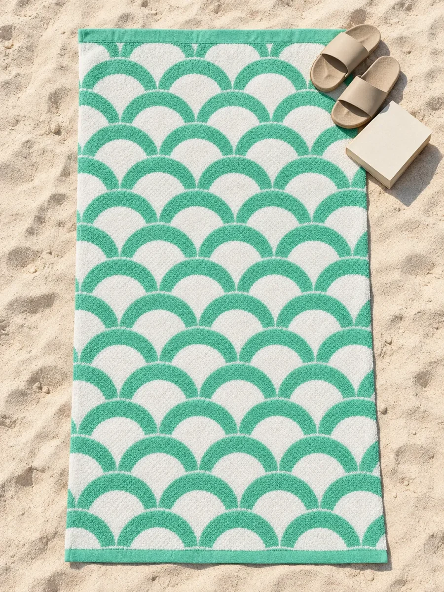 Scale Beach Towel spread out on the sand