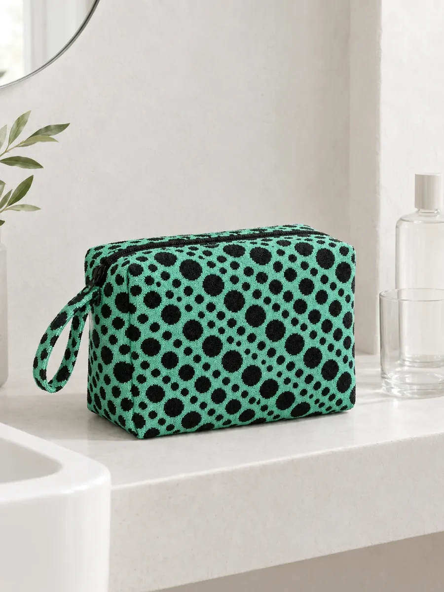 Shift Zip Wash Bag on a bathroom shelf (other items not included)