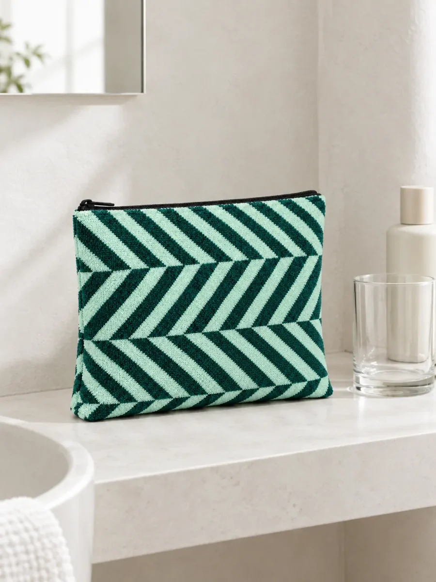 Twist Flat Pouches, Set of 2 on a bathroom shelf (other items not included)