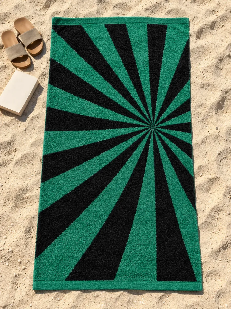 Vortex Beach Towel spread out on the sand